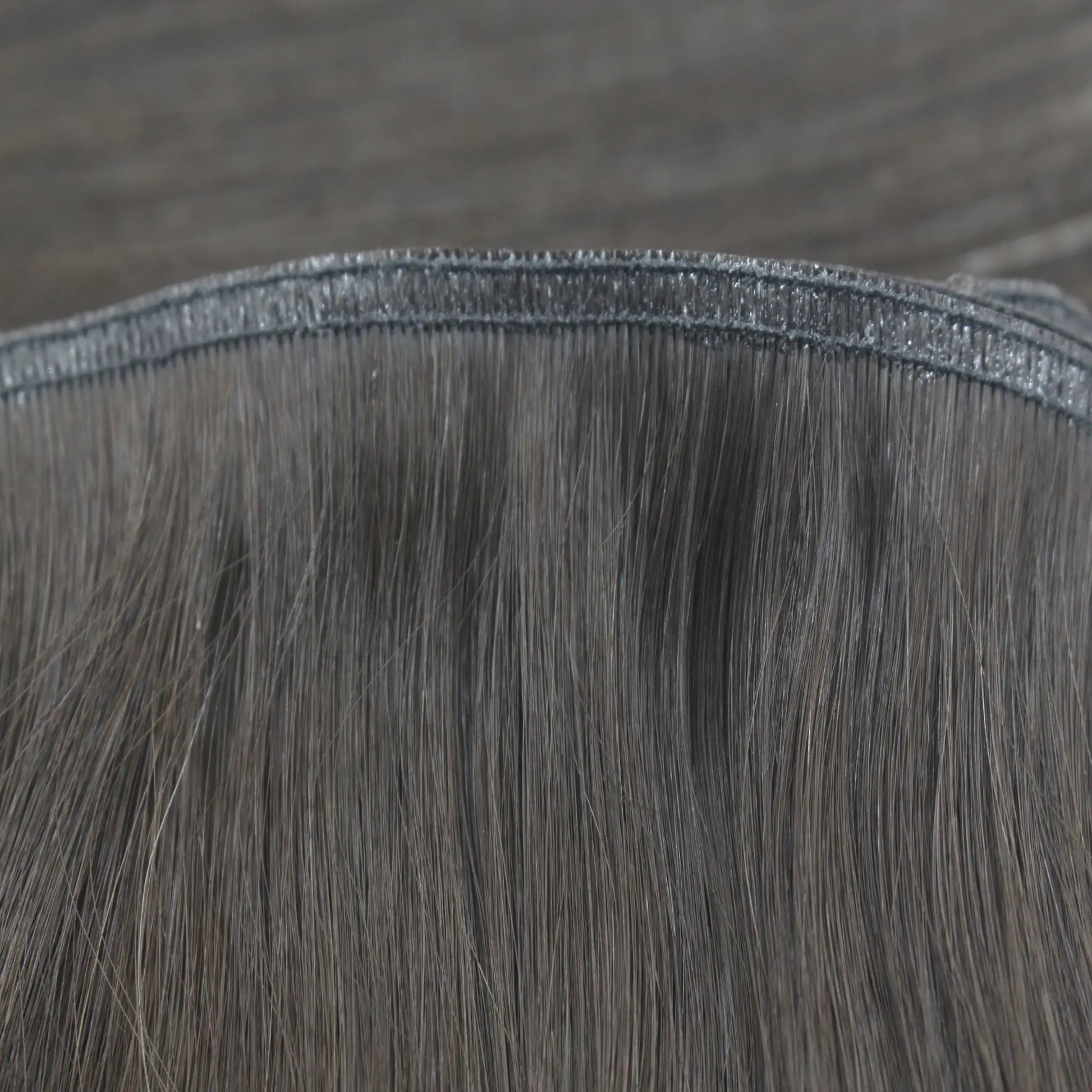 Anti-shedding design flat weft extensions